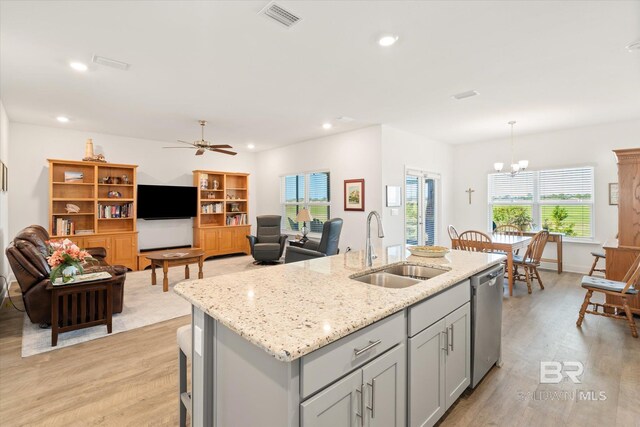 4299 Montague Dr, Gulf Shores, AL 36542 - kitchen with a sink, dishwasher, gray cabinetry, light wood-style flooring, and recessed lighting