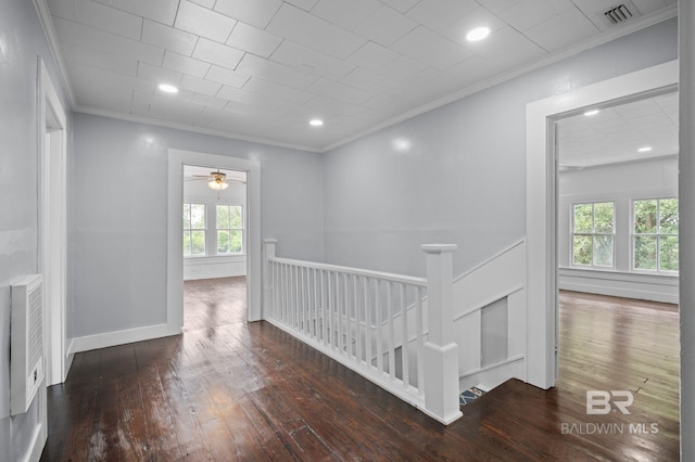 interior space featuring visible vents, ornamental molding, recessed lighting, and hardwood / wood-style floors