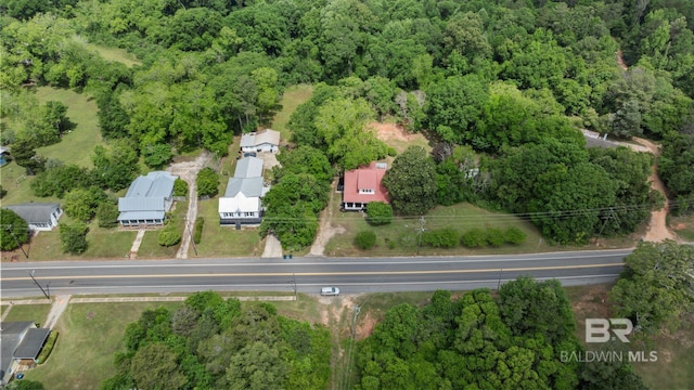aerial view with a wooded view