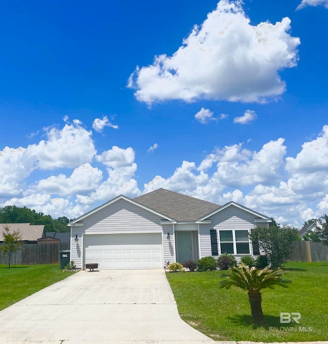 single story home featuring a garage and a front yard