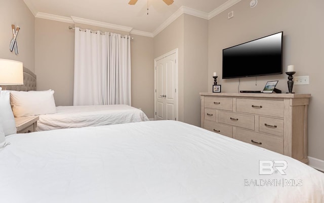 bedroom with ceiling fan and crown molding