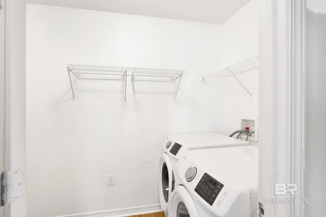 laundry area featuring separate washer and dryer