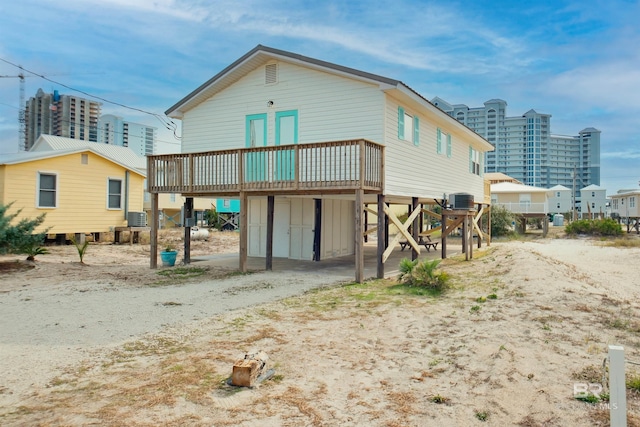 back of property with central air condition unit