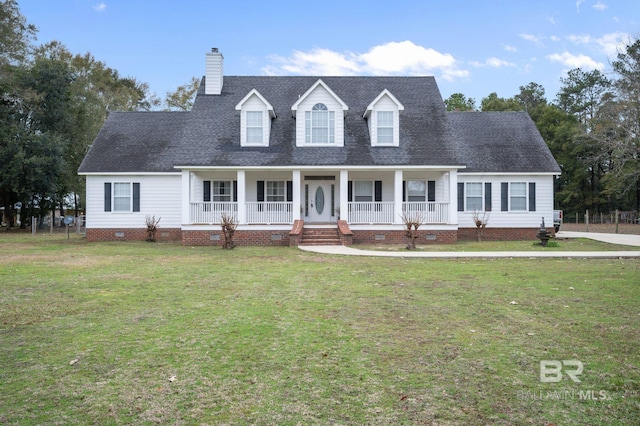 cape cod house with covered porch and a front lawn