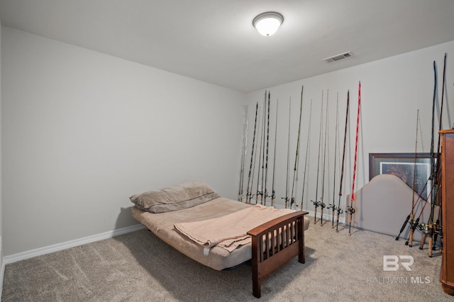 bedroom featuring light carpet