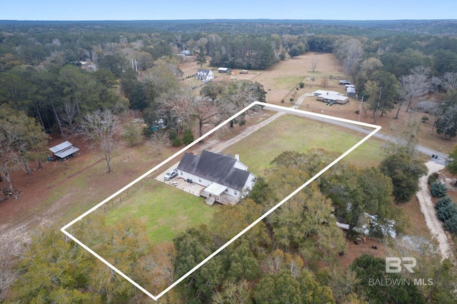 birds eye view of property featuring a rural view