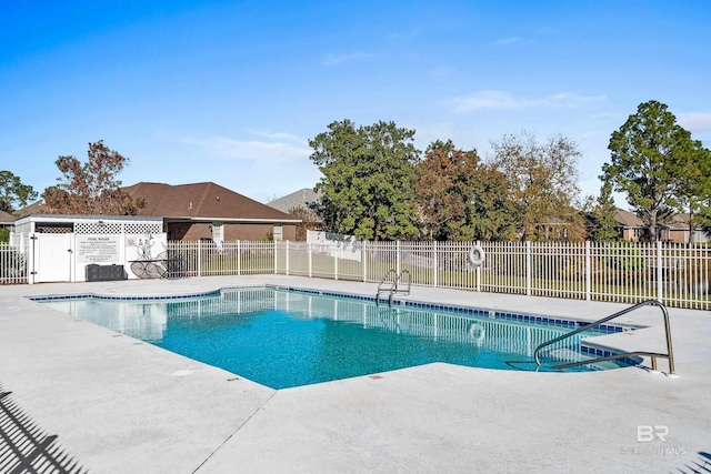 view of pool featuring a patio