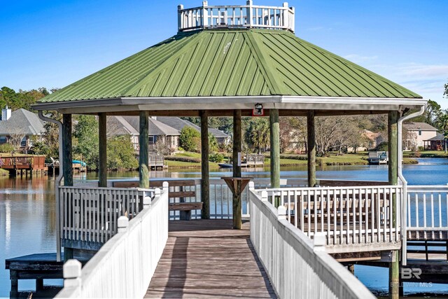 dock area with a water view