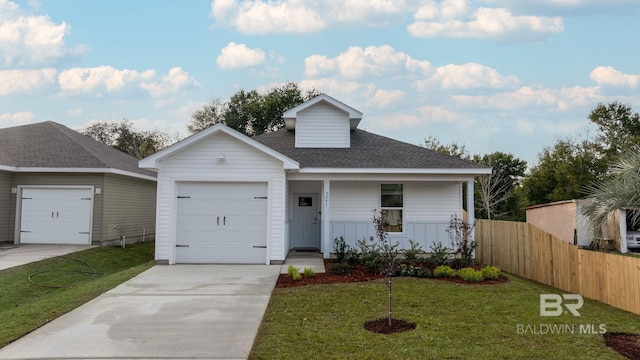 5241 Plateau Rd, Pensacola, FL 32507 - view of front of home with roof with shingles, a garage, concrete driveway, and covered porch