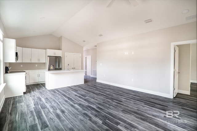 5241 Plateau Rd, Pensacola, FL 32507 - kitchen with stainless steel appliances, an island with sink, dark wood-style floors, high vaulted ceiling, and light countertops