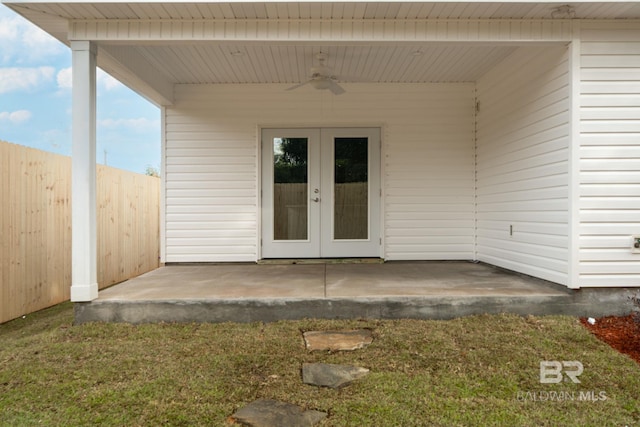 5241 Plateau Rd, Pensacola, FL 32507 - entrance to property with french doors, fence, a ceiling fan, and a patio