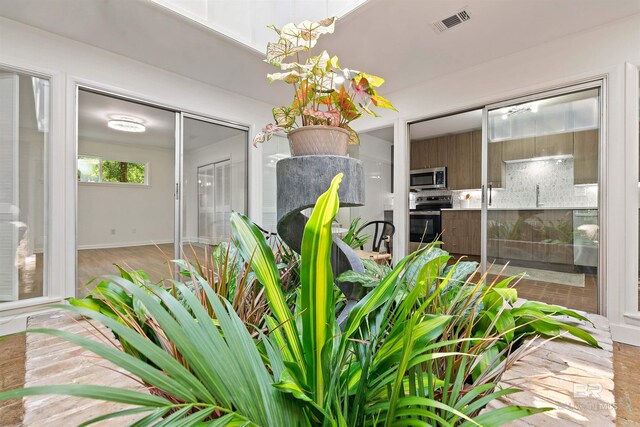 interior space featuring a skylight and a healthy amount of sunlight