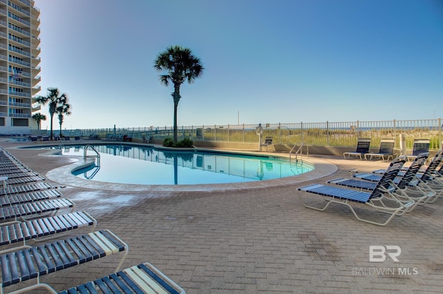 455 E Beach Blvd Unit 402, Gulf Shores, AL 36542 - pool featuring fence and a patio area