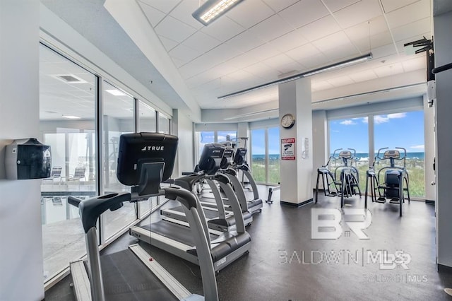 455 E Beach Blvd Unit 402, Gulf Shores, AL 36542 - gym with visible vents and a paneled ceiling