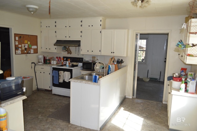 kitchen with sink, white cabinetry, and electric stove