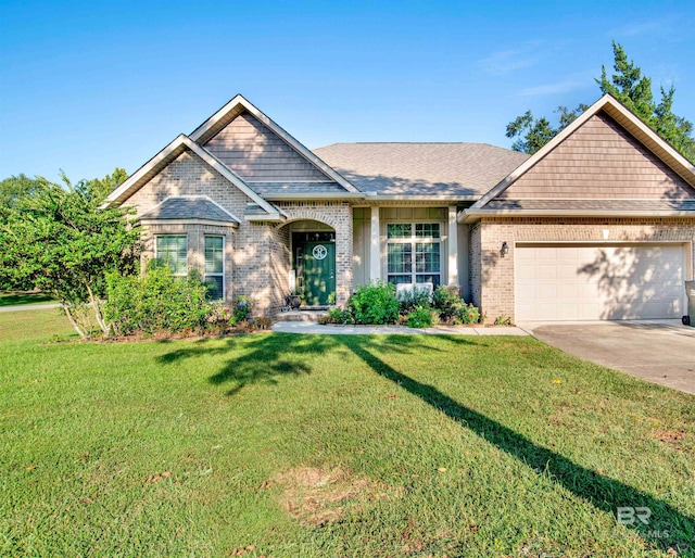 view of front facade featuring a garage and a front yard