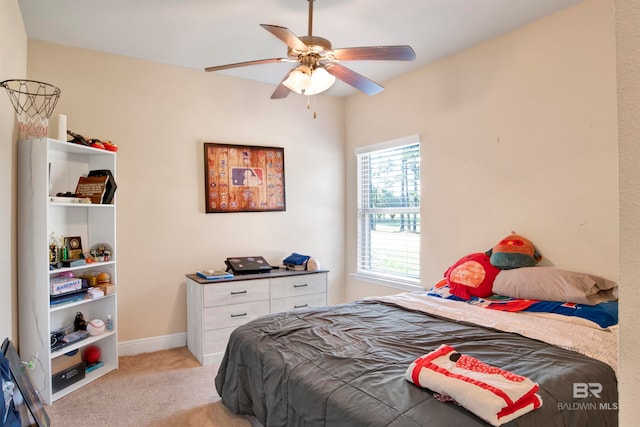 carpeted bedroom with ceiling fan