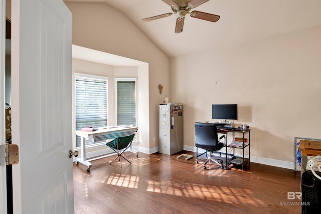 home office featuring lofted ceiling, hardwood / wood-style flooring, and ceiling fan