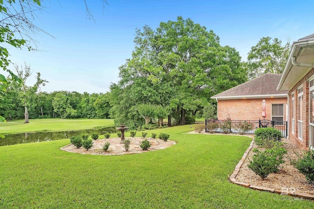 715 Village Dr, Gulf Shores, AL 36542 - view of grassy yard featuring a water view