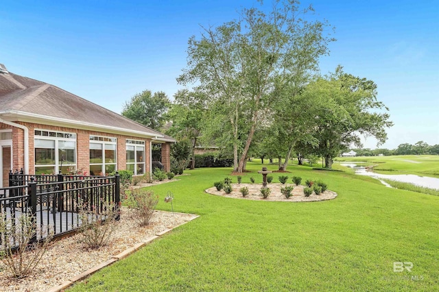 715 Village Dr, Gulf Shores, AL 36542 - view of green lawn with a water view