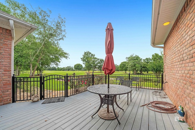 715 Village Dr, Gulf Shores, AL 36542 - deck featuring view of golf course and outdoor dining space