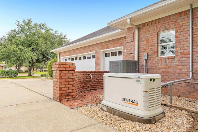 715 Village Dr, Gulf Shores, AL 36542 - view of property exterior featuring brick siding and an attached garage