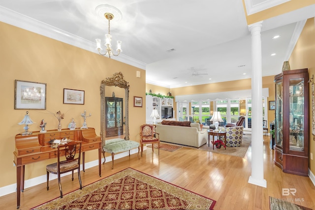 715 Village Dr, Gulf Shores, AL 36542 - living area with decorative columns, crown molding, light wood-type flooring, ceiling fan, and recessed lighting