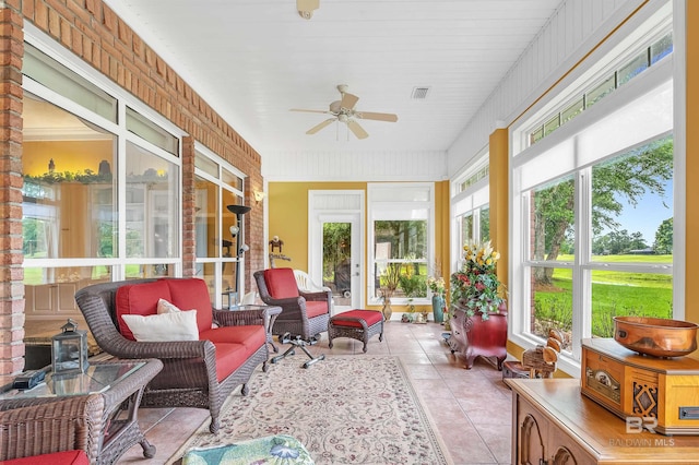 715 Village Dr, Gulf Shores, AL 36542 - sunroom with a ceiling fan and outdoor lounge area