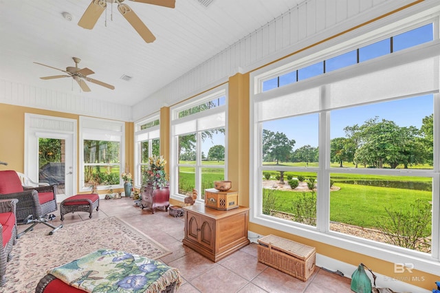 715 Village Dr, Gulf Shores, AL 36542 - sunroom with tile patterned flooring and plenty of natural light