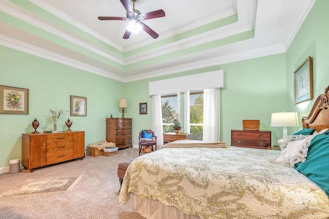 715 Village Dr, Gulf Shores, AL 36542 - carpeted bedroom featuring ornamental molding, a raised ceiling, and ceiling fan