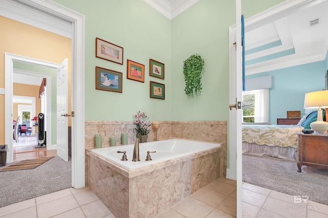 715 Village Dr, Gulf Shores, AL 36542 - bathroom with ornamental molding, a bath, tile patterned floors, and connected bathroom