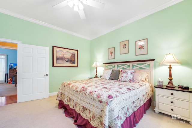 715 Village Dr, Gulf Shores, AL 36542 - bedroom featuring light carpet, ornamental molding, and a ceiling fan