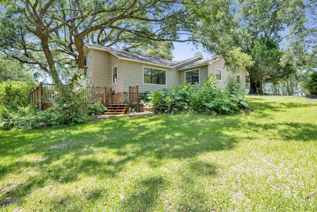 view of yard featuring a wooden deck