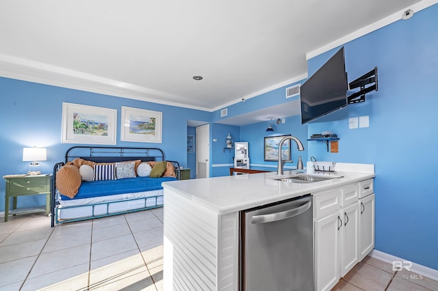 kitchen with open floor plan, a sink, visible vents, and stainless steel dishwasher