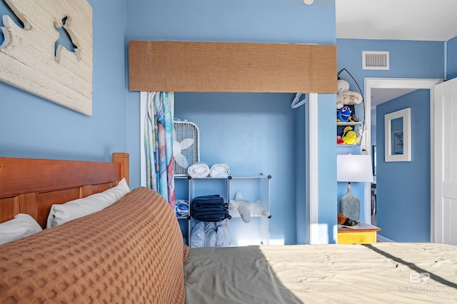 bedroom with visible vents