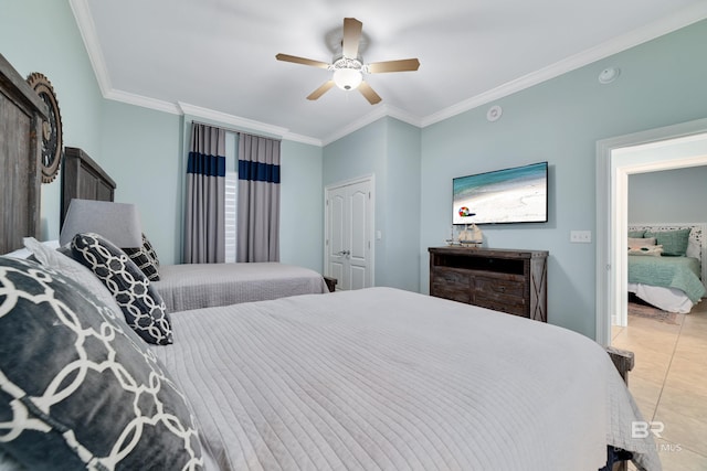 bedroom featuring ornamental molding, light tile patterned floors, and ceiling fan