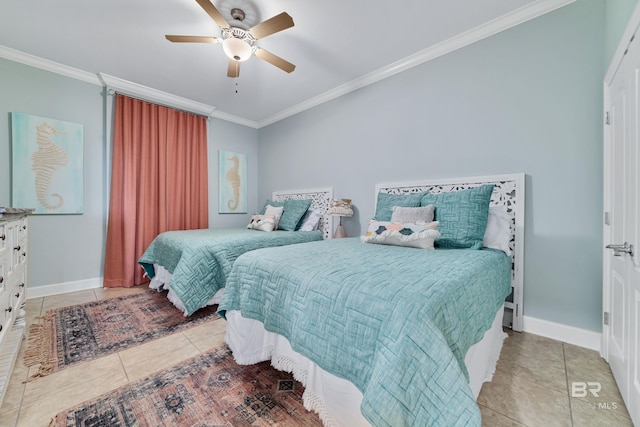 tiled bedroom featuring ornamental molding and ceiling fan