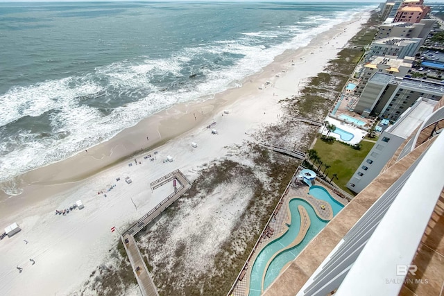 bird's eye view with a view of the beach and a water view