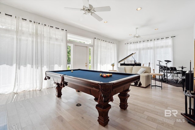 rec room with ceiling fan, light wood-type flooring, and pool table