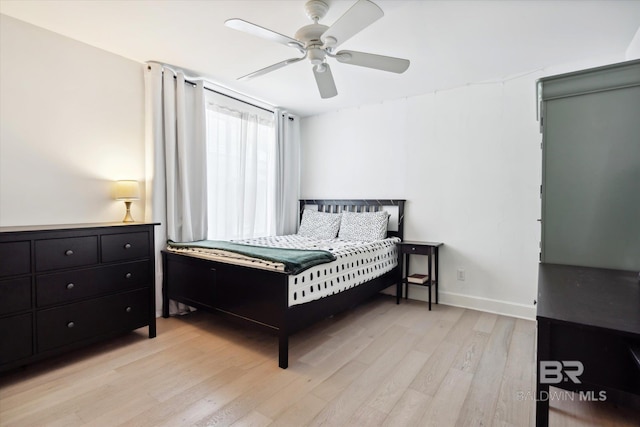 bedroom featuring ceiling fan and light hardwood / wood-style flooring