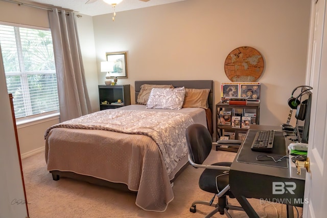 9362 Villas Dr, Foley, AL 36535 - carpeted bedroom featuring baseboards