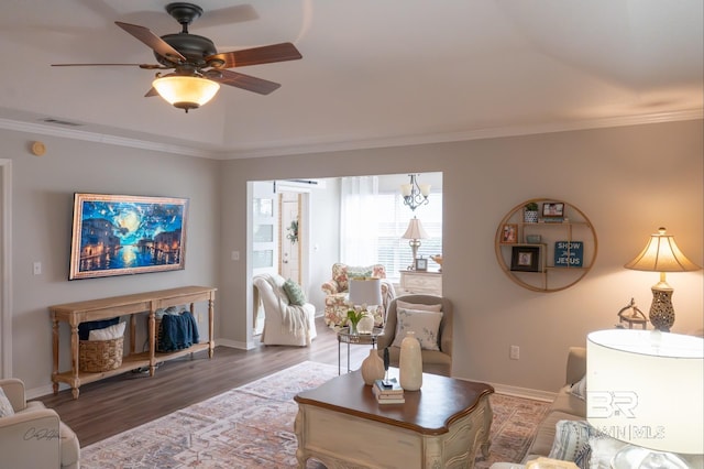 9362 Villas Dr, Foley, AL 36535 - living room with baseboards, a ceiling fan, wood finished floors, and crown molding