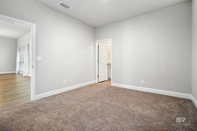 view of carpeted spare room