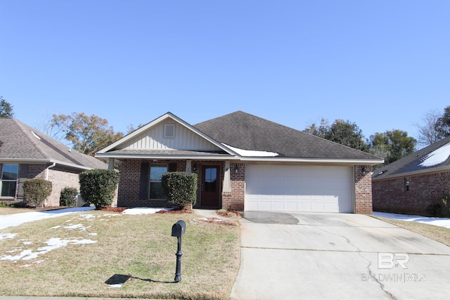 view of front of property with a garage and a front yard