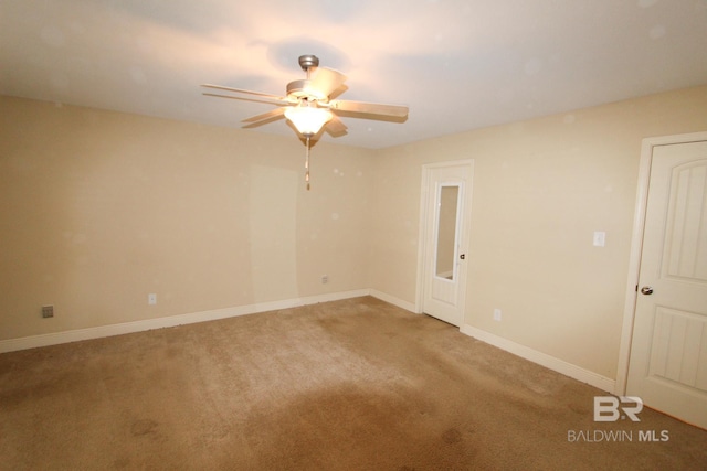 carpeted empty room with ceiling fan