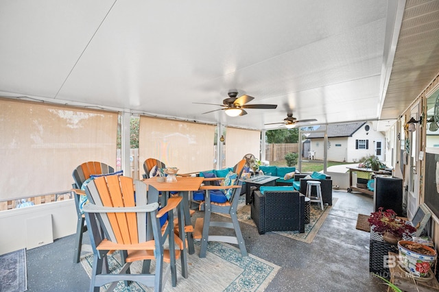 view of patio featuring an outdoor hangout area and ceiling fan