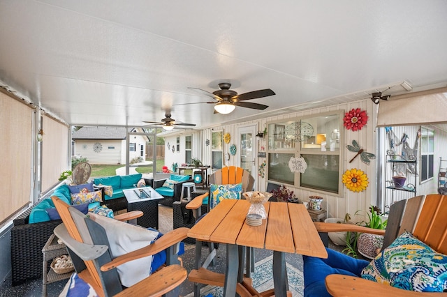 sunroom / solarium with ceiling fan