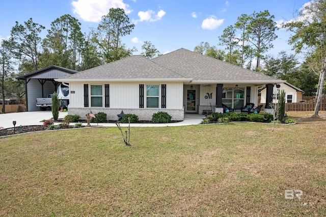 ranch-style house with a front lawn, a carport, and a porch