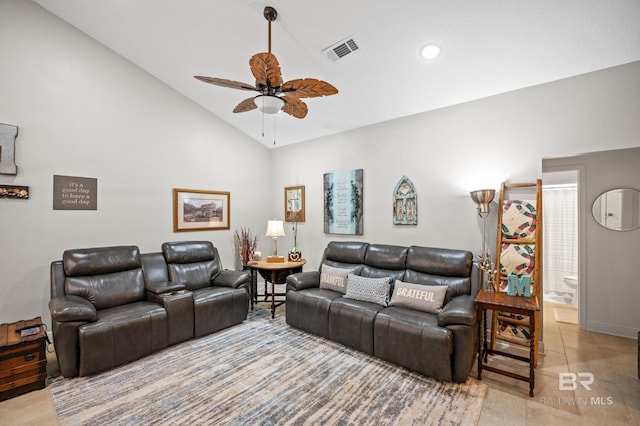 living room with ceiling fan and lofted ceiling