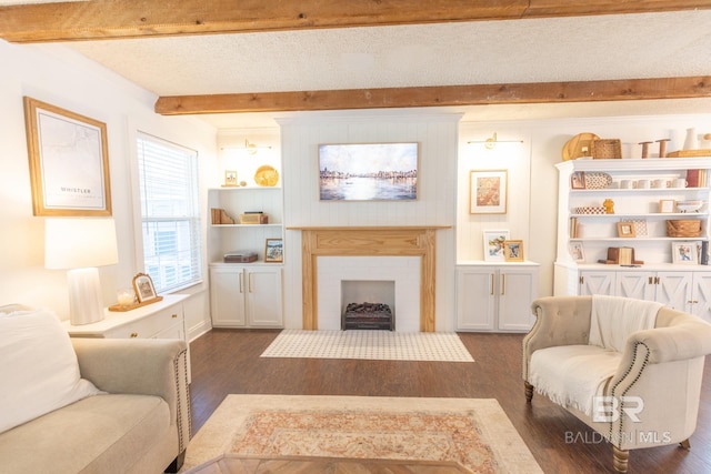 living room featuring beamed ceiling and dark hardwood / wood-style floors